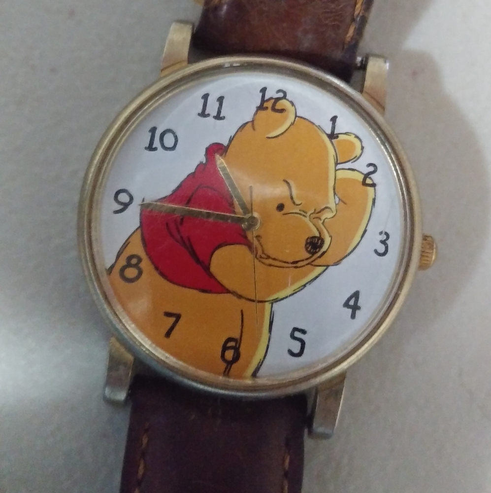 Timex Winnie the Pooh wrist watch, works. Has new battery